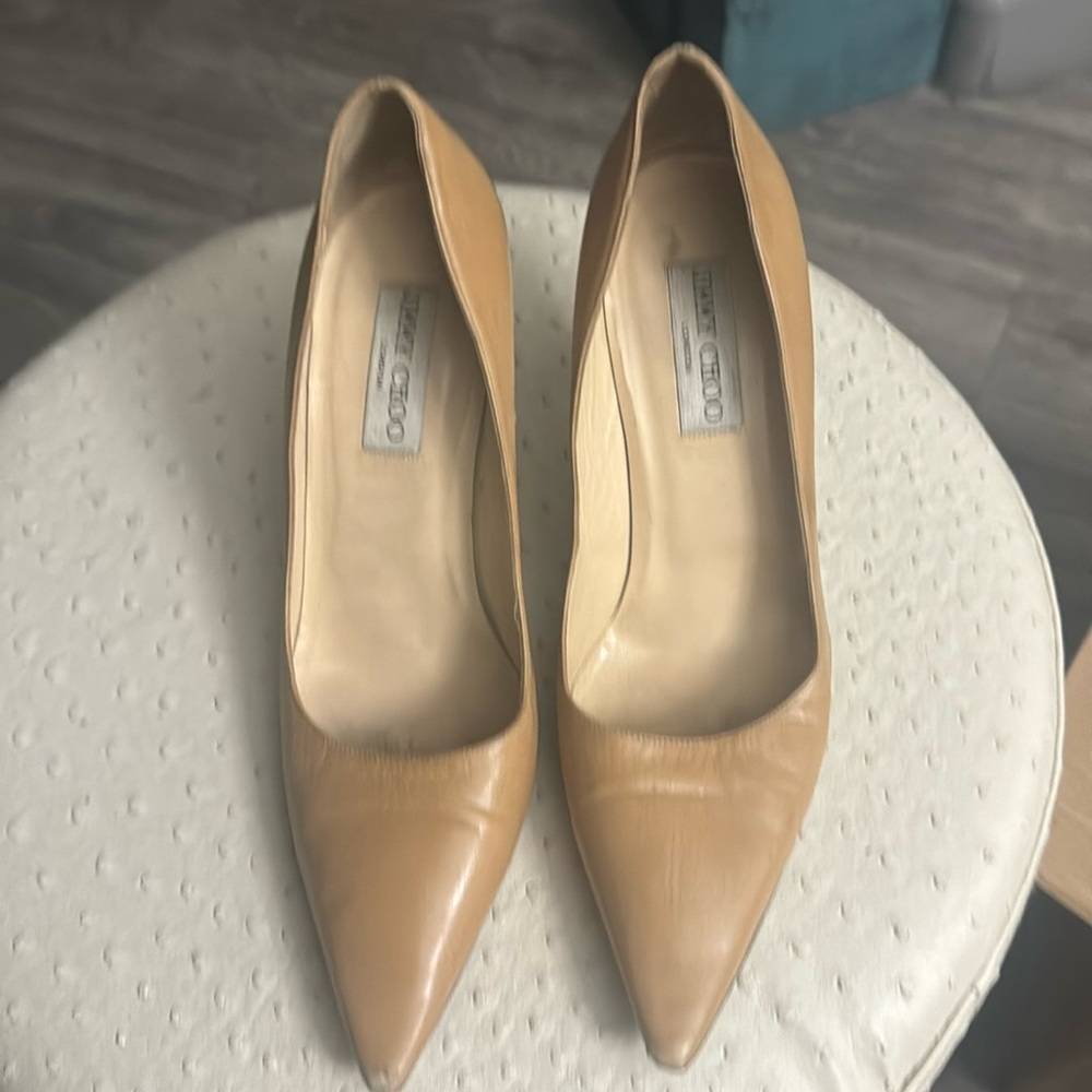 vintage Jimmy Choi’s has a missing heel stop a shoe repair could quickly fix